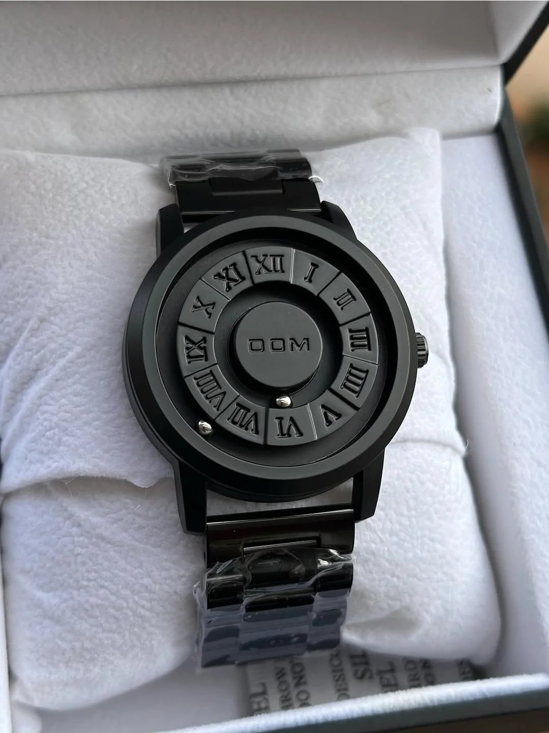 Plain black Dom watch with magnetic ball point